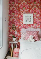Bedroom with feature wall patterned wallpaper