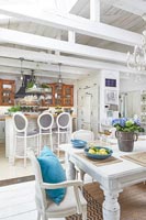 White painted shabby chic style kitchen-diner 
