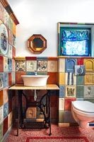 Bathroom with colourful tiling
