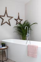 Star ornaments on modern bathroom wall 