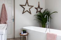Star ornaments on modern bathroom wall 