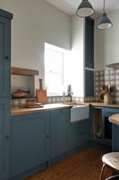 Blue and brown kitchen 