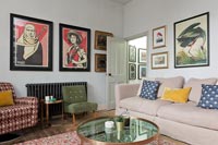 Vintage style artwork on modern living room wall 