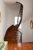 Wooden staircase and upstairs landing 