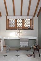 Country bathroom with roll top bath