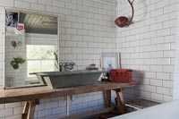 Sink with white metro brick tiling