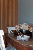 Dried flowers on wooden dining table 