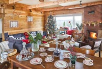 Modern country open plan living and dining space decorated for Christmas