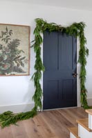 Christmas garland around door