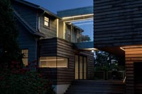 Contemporary house exterior - illuminated at night 