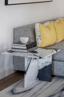 Marble side table in modern living room 