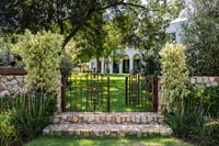 Ornate metal gates to garden - exterior 
