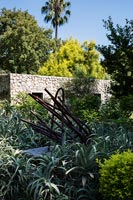 Large metal sculpture in garden 