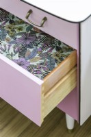 Complimentary patterned paper added inside the drawers 