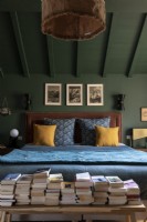  cosy master bedroom painted in green