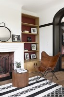 Leather butterfly chair in modern living room 