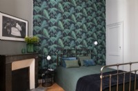 Modern bedroom with colourful wallpaper 