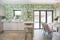 Modern kitchen diner will wallpapered feature wall