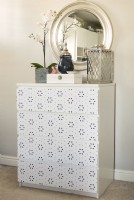 Decorative chest of drawers in modern bedroom 