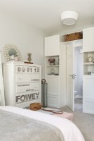 Modern bedroom furniture - built-in units around door