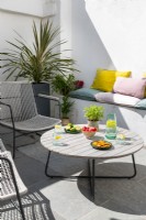 Modern furniture in courtyard garden