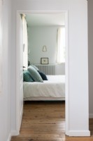 View through doorway into bedroom