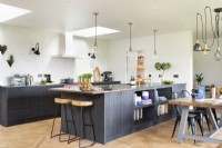 Modern country kitchen with dark cupboards