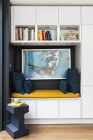 Contemporary kitchen extension with a blue and yellow seat, bench, reading nooks.