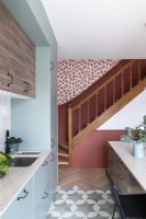 Modern kitchen with staircase 