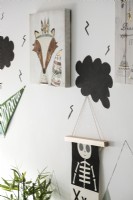 Display of pictures on childrens room wall