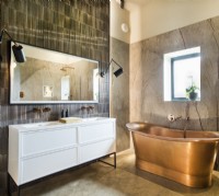Copper freestanding bath in luxury bathroom