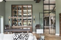 Large drinks cabinet against wall in modern living room