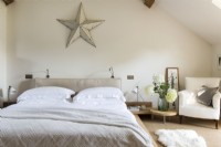 Large star on wall of modern bedroom