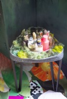 Side table of toiletries in colourful bedroom - detail 