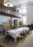 Classic style dining room in coverted chapel