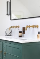 Twin sink unit with gold taps