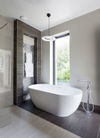 Freestanding bath in minimal contemporary bathroom