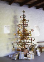 Salvaged metal turnstile reused as a Christmas tree 