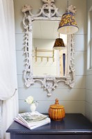 Vintage mirror with pendant light and pot