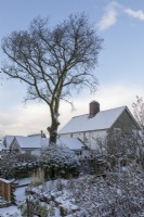 Cottage on Dartmoor with a covering of snow.
