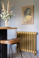 Gold painted cast iron traditional radiator