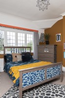 Bed with animal print footboard