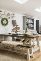Picnic style dining table decorated for Christmas