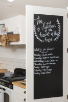 Chalkboard on kitchen cupboard door - detail 