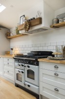 Country style range cooker in modern kitchen