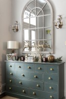 Large sideboard in hallway decorated for Christmas