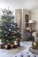 Large Christmas tree in classic living room