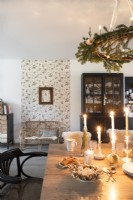 Candles on country dining table - Christmas