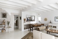 White painted open plan country living and dining space