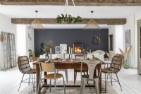 Black feature wall in country living space decorated for Christmas 